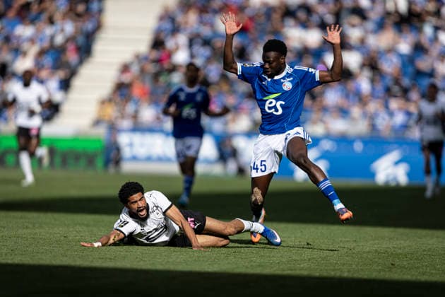 FOOTBALL : Racing de Strasbourg - Stade Rennes F. C - Ligue 1 - Stade de la Meinau - 19 04 2026 Mahdi Camara 45 Stade Rennes F. C et Cisse Amadou 45 Racing de Strasbourg  Copyright: xelyxandroxcegarrax