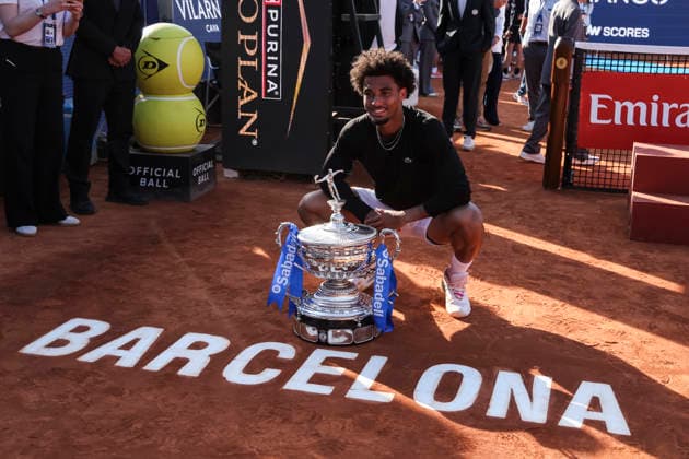 April 19, 2026, Barcelona, Barcelona, Spain: Arthur Fils of France celebrates with the championship trophy during the Final tennis match of the Barcelona Open Banc Sabadell - Conde Godo 2026 Day 9 at Real Club de Tenis Barcelona on April 19, 2026 in Barcelona, Spain. Barcelona Open Banc Sabadell - Conde Godo 2026 Day 9  - ZUMAa181 20260419_zaa_a181_106 Copyright: xJavierxBorregox