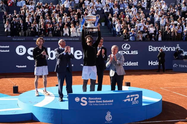 April 19, 2026, Barcelona, Barcelona, Spain: Arthur Fils of France celebrates with the championship trophy during the Final tennis match of the Barcelona Open Banc Sabadell - Conde Godo 2026 Day 9 at Real Club de Tenis Barcelona on April 19, 2026 in Barcelona, Spain. Barcelona Open Banc Sabadell - Conde Godo 2026 Day 9  - ZUMAa181 20260419_zaa_a181_109 Copyright: xJavierxBorregox