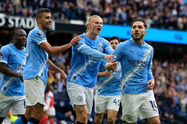 Manchester City v Arsenal, Premier League Rayan Cherki (10) of Manchester City celebrates calmly after scoring to make it 1-0 with Erling Haaland (9) of Manchester City during the Premier League match between Manchester City and Arsenal at the Etihad Stadium, Manchester, UK on 19 April 2026. Manchester Etihad Stadium Manchester UK Editorial use only DataCo restrictions apply See www.football-dataco.com , Copyright: xConorxMolloyx PSI-24102-0174