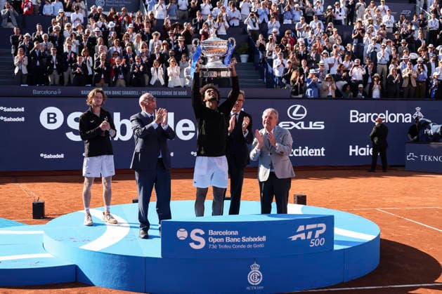 April 19, 2026, Barcelona, Barcelona, Spain: Arthur Fils of France celebrates with the championship trophy during the Final tennis match of the Barcelona Open Banc Sabadell - Conde Godo 2026 Day 9 at Real Club de Tenis Barcelona on April 19, 2026 in Barcelona, Spain. Barcelona Spain - ZUMAa181 20260419_zaa_a181_110 Copyright: xJavierxBorregox