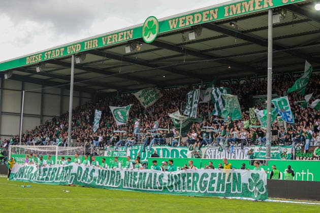 Fürth, Germany 19 April 2026 2 Bundesliga 30 Matchday SpVgg Greuther Fürth vs SV Darmstadt 98 In the picture Symbolic image The Greuther Fürth team during the final cheer in front of the Greuther Fürth fan curve with action banner DFL regulations prohibit any use of photographs as image sequences and or quasi video Copyright: HMBxMedia MadeleinexFantini