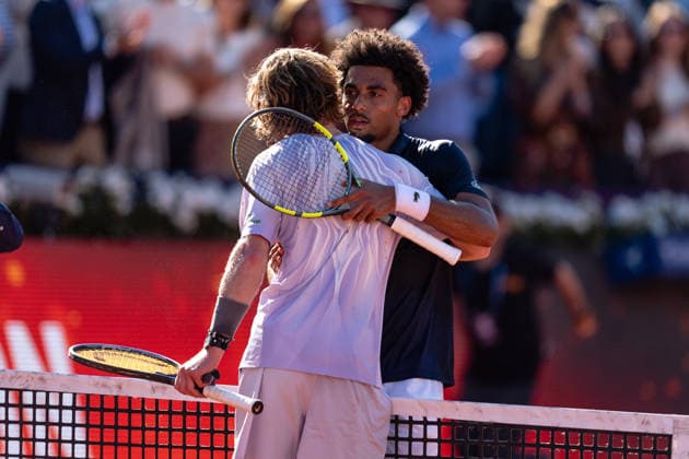 (260420) -- BARCELONA, April 20, 2026 -- Arthur Fils (R) of France hugs Andrey Rublev of Russia after the men s singles final tennis match between Arthur Fils of France and Andrey Rublev of Russia at the ATP, Tennis Herren Barcelona Open Banc Sabadell 2026 in Barcelona, Spain, on April 19, 2026. (Photo by Xinhua) (SP)SPAIN-BARCELONA-TENNIS-ATP-BARCELONA OPEN-MEN S SINGLES-FINAL JoanxGosa 