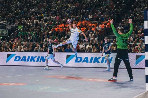 19 4 2026, Handball, Lidl, Final Four, Final, Final, Cologne, Lanxess Arena, Bergischer HC, Füchse Berlin, 2026 Lukas Diedrich Bergischer HC holds a throw from Av Teigum Hakun West Berlin Lanxess Arena, Cologne North Rhine-Westphalia Germany P1026241-2