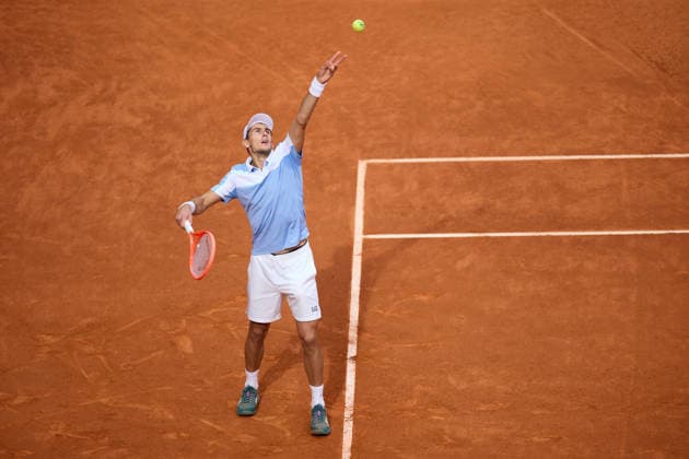 Mutua Madrid Open - Day One Matteo Arnaldy of Italy serves against Dusan Lajovic of Serbia during the Men™s Singles First Round Qualifying match on day one of the Mutua Madrid Open at Caja Magica on April 20, 2026, in Madrid, Spain. Madrid Caja Magica Madrid Spain RL_MMO2K26_000063 Copyright: xRicardoxLarreinax