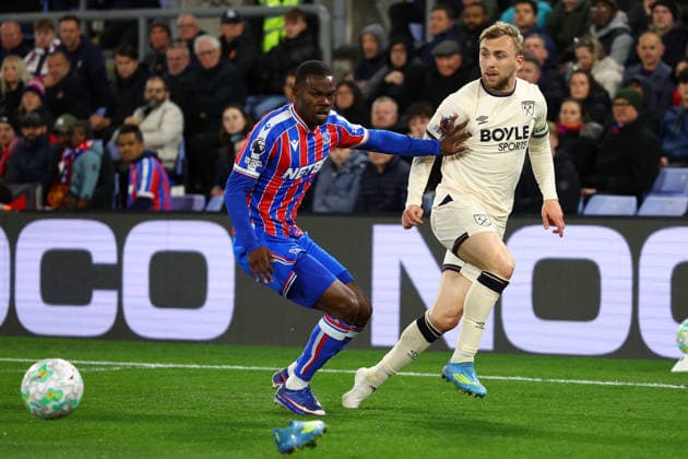 London, England, 20th April 2026. Tyrick Mitchell of Crystal Palace and Jarrod Bowen of West Ham United challenge for the ball during the Crystal Palace vs West Ham United Premier League match at Selhurst Park, London. Picture credit should read: Paul Terry Sportimage EDITORIAL USE ONLY. No use with unauthorised audio, video, data, fixture lists, club league logos or live services. Online in-match use limited to 120 images, no video emulation. No use in betting, games or single club league player publications. SPI_020_PT_Crystal_Palace_West_Ham SPI-4705-0020