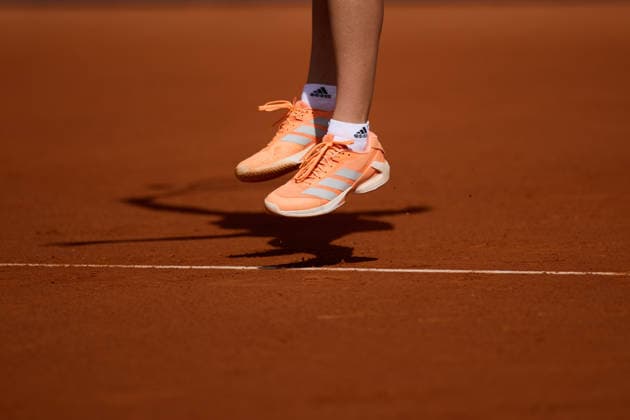 Mutua Madrid Open - Day Three A detail view of the shoes of Carlota Martinez Cirez of Spain serves against Zeynep Sommez of Turkey during the GirlÕs Singles match on day three of the Mutua Madrid Open at Caja Magica on April 22, 2026, in Madrid, Spain. Madrid Caja Magica Madrid Spain RL_MMO2K26_000373 Copyright: xRicardoxLarreinax
