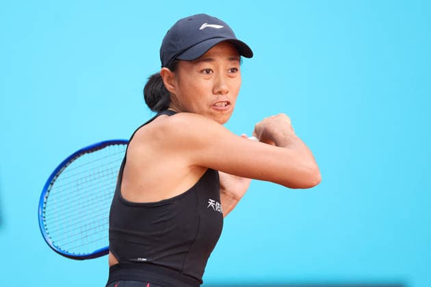 Mutua Madrid Open - Day Three Shuai Zhang of China plays a forehand against Eva Lys of Germany during the GirlÕs Singles match on day three of the Mutua Madrid Open at Caja Magica on April 22, 2026, in Madrid, Spain. Madrid Caja Magica Madrid Spain RL_MMO2K26_000426 Copyright: xRicardoxLarreinax