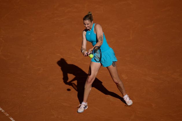 Mutua Madrid Open - Day Three Karolina Pliskova of Czech Republic plays a backhand against Sinja Kraus of Austria during the GirlÕs Singles match on day three of the Mutua Madrid Open at Caja Magica on April 22, 2026, in Madrid, Spain. Madrid Caja Magica Madrid Spain RL_MMO2K26_000560 Copyright: xRicardoxLarreinax