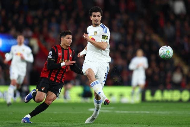 Bournemouth, England, 22nd April 2026. Evanilson of Bournemouth and Pascal Struijk of Leeds United challenge for the ball during the AFC Bournemouth vs Leeds United Premier League match at the Vitality Stadium, Bournemouth. Picture credit should read: Paul Terry Sportimage EDITORIAL USE ONLY. No use with unauthorised audio, video, data, fixture lists, club league logos or live services. Online in-match use limited to 120 images, no video emulation. No use in betting, games or single club league player publications. SPI_016_PT_Bournemouth_Leeds SPI-4707-0016