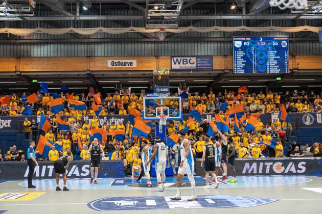 The Weissenfels fan block supports its team GER, Syntainics MBC vs Manchester Basketball Club, Basketball, European North Basketball League, semi-finals, 2025 2026 season, 22 04 2026 GER, Syntainics MBC vs Manchester Basketball Club, Basketball, European North Basketball League, semi-finals, 2025 2026 season, 22 04 2026 Weissenfels Copyright: xEibner-Pressefoto PiaxSchindlerx EP_PSR