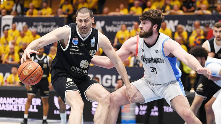 Basketball, ENBL VIMODROM Final Four 2026, Semi-final, SYNTAINICS MBC Mitteldeutscher Basketball Club Weissenfels vs Manchester Basketball 22 04 2026 86 89 49 42 Duel for the ball between Nemanja Durisic Forward Syntainics MBC, back number 42 left and Matthew Matt Nicholson Center Manchester Basketball, back number 34 right during the game MBC Weißenfels vs Manchester Basketball 22 04 2026 Weißenfels Saxony Anhalt Germany Stadthalle Weißenfels