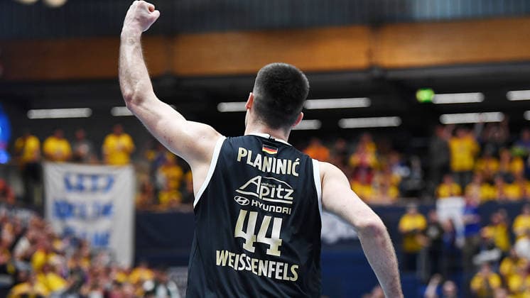 Basketball, ENBL VIMODROM Final Four 2026, semi-final, SYNTAINICS MBC Mitteldeutscher Basketball Club Weissenfels vs Manchester Basketball 22 04 2026 86 89 49 42 Jure Planinic Center Syntainics MBC, back number 44 cheers during the game MBC Weißenfels vs Manchester Basketball 22 04 2026 Weißenfels Saxony Anhalt Germany Stadthalle Weißenfels