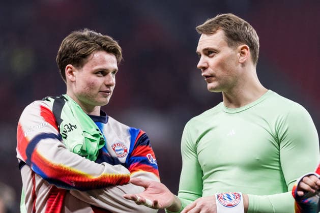 LEVERKUSEN, GERMANY - APRIL 22: Jonas Urbig (FC Bayern Muenchen, 40) and Manuel Neuer (FC Bayern Muenchen, 1) together after winning the DFB Pokal Semi final match between Bayer 04 Leverkusen vs. FC Bayern Muenchen at BayArena during semi final of the DFB Pokal season 2025 26 on April 22, 2026 in Leverkusen, Germany. North Rhine Westphalia Germany Copyright: xSteffiexWunderlx