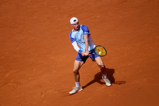 Mutua Madrid Open - Day Four Marton Fucsovics of Hungary plays a backhand against Pablo Carreno of Spain during the MenÕs Singles match on day four of the Mutua Madrid Open at Caja Magica on April 23, 2026, in Madrid, Spain. Madrid Caja Magica Madrid Spain RL_MMO2K26_000704 Copyright: xRicardoxLarreinax