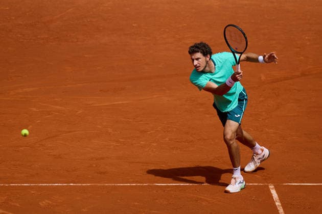 Mutua Madrid Open - Day Four Pablo Carreno of Spain plays a forehand against Marton Fucsovics of Hungary during the MenÕs Singles match on day four of the Mutua Madrid Open at Caja Magica on April 23, 2026, in Madrid, Spain. Madrid Caja Magica Madrid Spain RL_MMO2K26_000718 Copyright: xRicardoxLarreinax