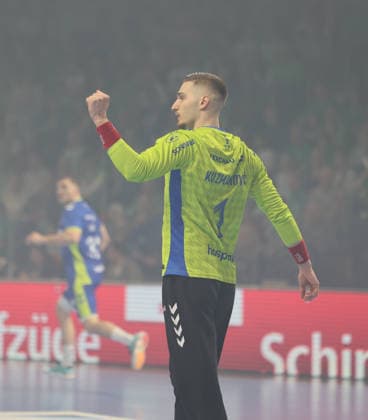 GER HBL Season 2025 2026 FÜCHSE Berlin vs VfL Gummersbach, 23 04 26, Max Schmeling Halle, Berlin, Dominik KUZMANIVIC VfL Gummersbach 1 cheers after a successful save, Emotion, Fist