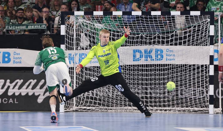 Tobias Schjoelberg Groendahl scores a goal against goalkeeper Bertram Obling duel Game scene Action Sport Handball HBL Bundesliga Men 29 Matchday Season 2025 2026 23 04 2026 Füchse Berlin vs VfL Gummersbach