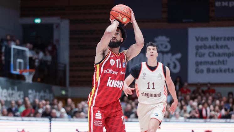 In the picture Davion Mintz Wuerzburg Baskets, 10 with the three-pointer 23 04 2026, Basketball, Fitness First Wuerzburg Baskets vs FC Bayern Muenchen Basketball, easyCredit BBL, 26 Matchday, Germany, 97072, tectake Arena Wuerzburg, Copyright: HMBxMedia xJulienxBecker