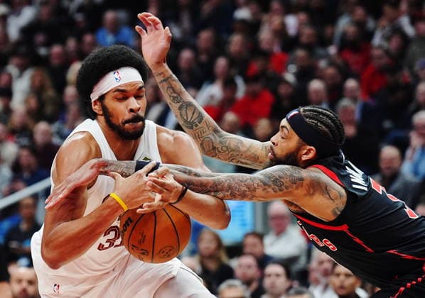 April 23, 2026, Toronto, On, Canada: Cleveland Cavaliers Jarrett Allen (left) is fouled by Toronto Raptors Brandon Ingram (3) during first half NBA, Basketball Herren, USA playoff basketball action in Toronto on Thursday, April 23, 2026. Canada News - April 23, 2026  - ZUMAc35_ 20260423_zaf_c35_112 Copyright: xFrankxGunnx