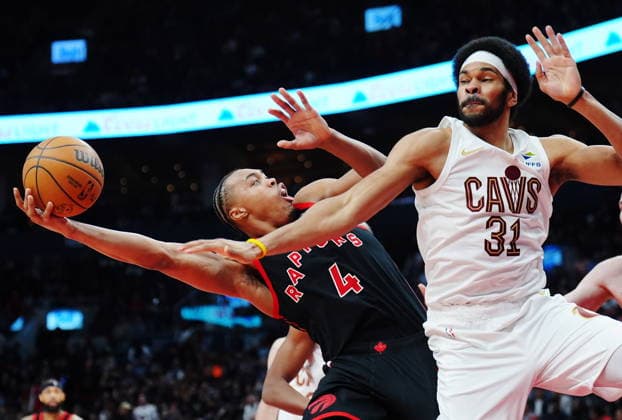 April 23, 2026, Toronto, On, Canada: Toronto Raptors Scottie Barnes (4) tries to shoot over Cleveland Cavaliers Jarrett Allen (31) during second half NBA, Basketball Herren, USA playoff basketball action in Toronto on Thursday, April 23, 2026. Canada News - April 23, 2026  - ZUMAc35_ 20260423_zaf_c35_125 Copyright: xFrankxGunnx