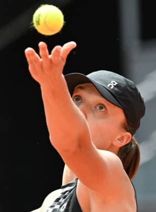 (260424) -- MADRID, April 24, 2026 -- Iga Swiatek of Poland serves during the women s singles round of 64 match between Iga Swiatek of Poland and Daria Snigur of Ukraine at the 2026 Madrid Open tennis tournament in Madrid, Spain, on April 23, 2026. ) (SP)SPAIN-MADRID-TENNIS-MADRID OPEN-WOMEN S SINGLES ChengxMin 