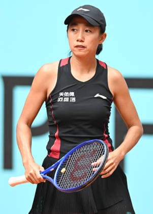 (260424) -- MADRID, April 24, 2026 -- Zhang Shuai reacts during the women s singles round of 64 match between Zhang Shuai of China and Anastasia Potapova of Austria at the 2026 Madrid Open tennis tournament in Madrid, Spain, on April 24, 2026. ) (SP)SPAIN-MADRID-TENNIS-MADRID OPEN-WOMEN S SINGLES ChengxMin 