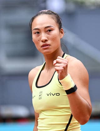 (260424) -- MADRID, April 24, 2026 -- Zheng Qinwen celebrates scoring during the women s singles round of 64 match between Zheng Qinwen of China and Sofia Kenin of the United States at the 2026 Madrid Open tennis tournament in Madrid, Spain, on April 24, 2026. ) (SP)SPAIN-MADRID-TENNIS-MADRID OPEN-WOMEN S SINGLES ChengxMin 