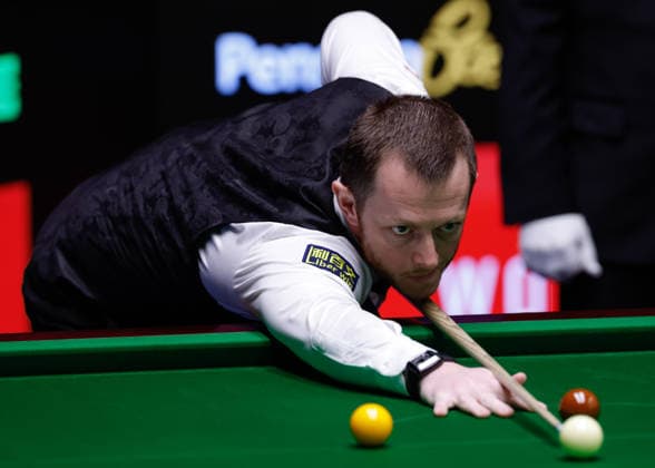 Sheffield, England, 24th April 2026. Mark Allen takes a shot during the Kyren Wilson vs Mark Allen Halo World Championship, WM, Weltmeisterschaft 2026 match at The Crucible, Sheffield. Picture credit should read: Cody Froggatt Sportimage EDITORIAL USE ONLY. No use with unauthorised audio, video, data, fixture lists, club league logos or live services. Online in-match use limited to 120 images, no video emulation. No use in betting, games or single club league player publications. SPI_103_CF_Sheffield_Snooker_World_Championship_Day_7 SPI-4744-0008
