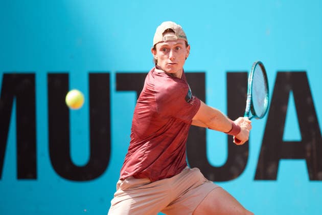 Mutua Madrid Open - Day Five Ignacio Buse of Peru plays a backhand against Arthur Fils of France during the MenÕs Singles match on day five of the Mutua Madrid Open at Caja Magica on April 24, 2026, in Madrid, Spain. Madrid Caja Magica Madrid Spain RL_MMO2K26_001073 Copyright: xRicardoxLarreinax