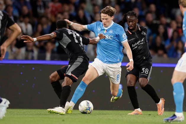 Italy: Serie a football match SSC Napoli vs Cremonese Cremonese s Nigerian forward David Okereke and Cremonese s French midfielder Warren Bondo challenges for the ball with Napoli s Scottish midfielder Scott McTominay during the Serie A football match between SSC Napoli vs Cremonese at the Diego Armando Maradona Stadium in Naples, on April 24, 2026. _BPH2643 Copyright: xAntonioxBalascox