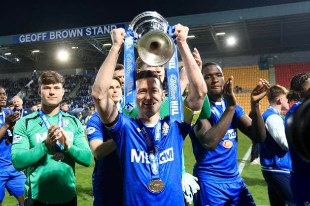RECORD DATE NOT STATED 24th April 2026; McDiarmid Park, Perth, Scotland: Scottish Championship Football, St Johnstone versus Raith Rovers; Jason Holt of St Johnstone with the SPFL Championship trophy DavidxYoung