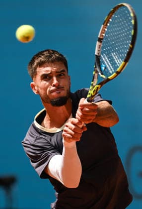 (260425) -- MADRID, April 25, 2026 -- Dino Prizmic hits a return during the men s singles round of 64 match between Dino Prizmic of Croatia and Ben Shelton of the United States at the 2026 Madrid Open tennis tournament in Madrid, Spain, on April 24, 2026. ) (SP)SPAIN-MADRID-TENNIS-MADRID OPEN-MEN S SINGLES ChengxMin 