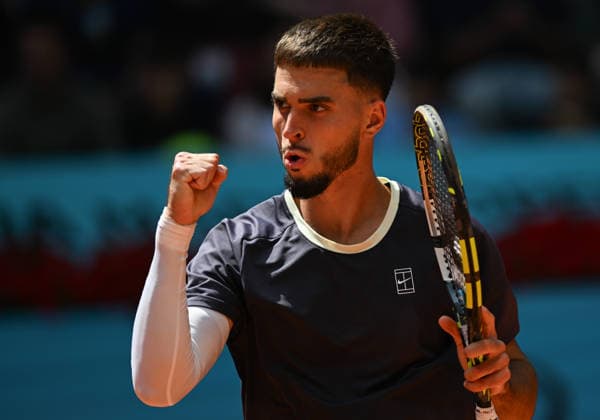 (260425) -- MADRID, April 25, 2026 -- Dino Prizmic celebrates a point during the men s singles round of 64 match between Dino Prizmic of Croatia and Ben Shelton of the United States at the 2026 Madrid Open tennis tournament in Madrid, Spain, on April 24, 2026. ) (SP)SPAIN-MADRID-TENNIS-MADRID OPEN-MEN S SINGLES ChengxMin 