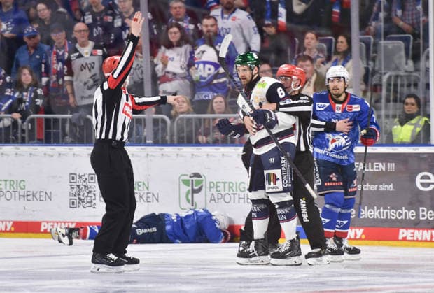 24 04 2026, xblx, Eishockey Penny DEL Final 2026, Adler Mannheim Eisbären Berlin v l Leon Gawanke Adler Mannheim , injured, injury, Kai Wissmann Eisbären Berlin , John Gilmour Adler Mannheim DFL DFB REGULATIONS PROHIBIT ANY USE OF PHOTOGRAPHS as IMAGE SEQUENCES and or QUASI VIDEO Mannheim