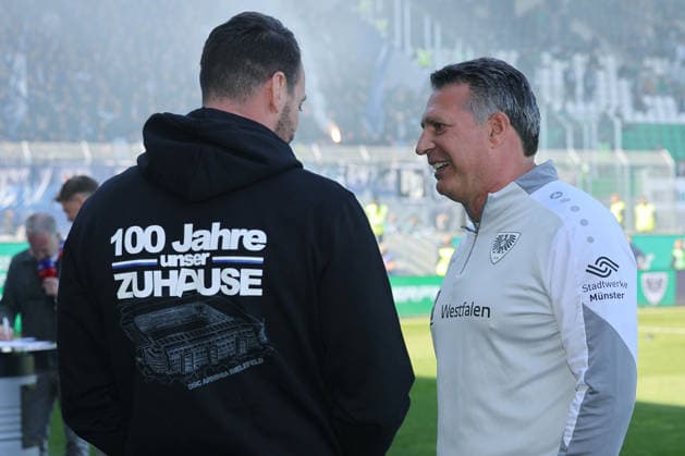 Soccer 2 Bundesliga 31 Matchday SC Preußen Münster DSC Arminia Bielefeld on 25 04 2026 at LVM Preußenstadion in Münster Michel Mitch Kniat Trainer Head Coach Bielefeld , left Alois Schwartz Trainer Head Coach Münster , right DFL regulations prohibit any use of photographs as image sequences and or quasi video xJRx