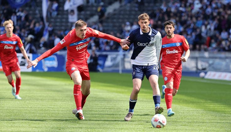 Marko Ivezic, Michael Cuisance duel match scene action sport football soccer DFL 2 Bundesliga men 31 matchday season 2025 2026 25 04 2026 Hertha BSC Berlin vs Holstein Kiel KSV DFL regulations prohibit any use of photographs as image sequences and or quasi video