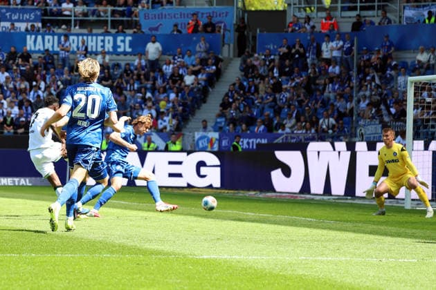 25 04 2026, xrekx, Soccer 2 Bundesliga, Karlsruher SC Hannover 96 v l Goal kick to 0 1 by Mustapha Bundu Hannover 96 DFL DFB REGULATIONS PROHIBIT ANY USE OF PHOTOGRAPHS as IMAGE SEQUENCES and or QUASI VIDEO Karlsruhe