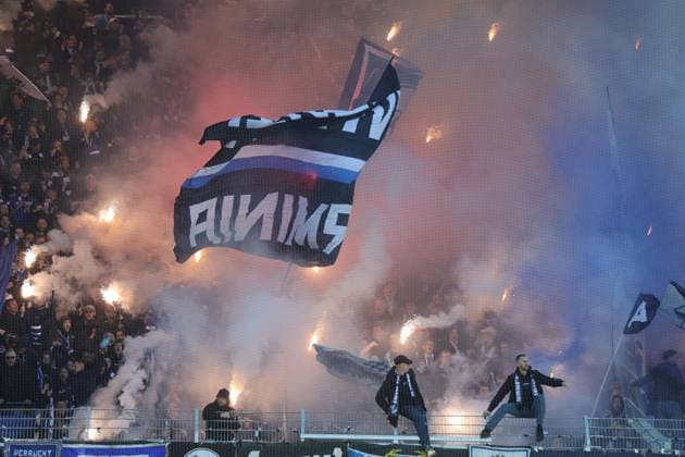 Soccer 2 Bundesliga 31 Matchday SC Preußen Münster DSC Arminia Bielefeld on 25 04 2026 at LVM Preußenstadion in Münster Bielefeld fans ignite Bengalos Pyro Pyrotechnics Flares Smoke bombs in the fan block DFL regulations prohibit any use of photographs as image sequences and or quasi video xJRx