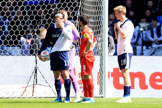 DEU, DFL, 2 FBL, Hertha BSC vs Holstein Kiel, 25 04 2026, Berliner Olympiastadion, Berlin, DEU, DFL, 2 FBL, Hertha BSC vs Holstein Kiel, im Bild 11m ja oder nein, Fabian Reese Hertha BSC Berlin 11 , Luca Schuler Hertha BSC Berlin 18 , UMUT TOHUMCU Holstein Kiel 8 DFL regulations prohibit any use of Photographs as image sequences and or quasi video nordphotoxGmbHx xEngler nph00076
