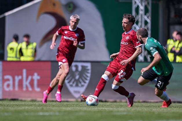 25 04 2026, Soccer, 2 Bundesliga, 31 Matchday Season 2025 2026, Preußen Münster DSC Arminia Bielefeld, Jannik Rochelt DSC Arminia Bielefeld , Rico Preißinger Preußen Münster xRHR PHOTO TKx Copyright: RHR-FOTOx RHR-FOTO TK