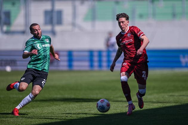 25 04 2026, Soccer, 2 Bundesliga, 31 Matchday Season 2025 2026, Preußen Münster DSC Arminia Bielefeld, Rico Preißinger Preußen Münster , Jannik Rochelt DSC Arminia Bielefeld xRHR PHOTO TKx Copyright: RHR-FOTOx RHR-FOTO TK