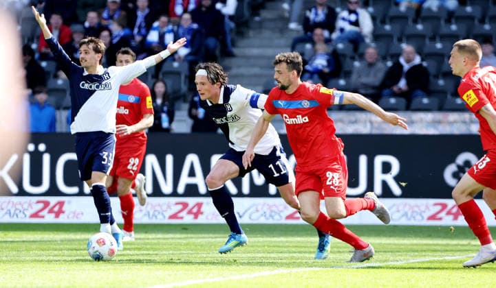 Fabian Reese, Jonas Meffert duel match scene Action Sport Football Soccer DFL 2 Bundesliga Men 31 Matchday Season 2025 2026 25 04 2026 Hertha BSC Berlin vs Holstein Kiel KSV DFL regulations prohibit any use of photographs as image sequences and or quasi video