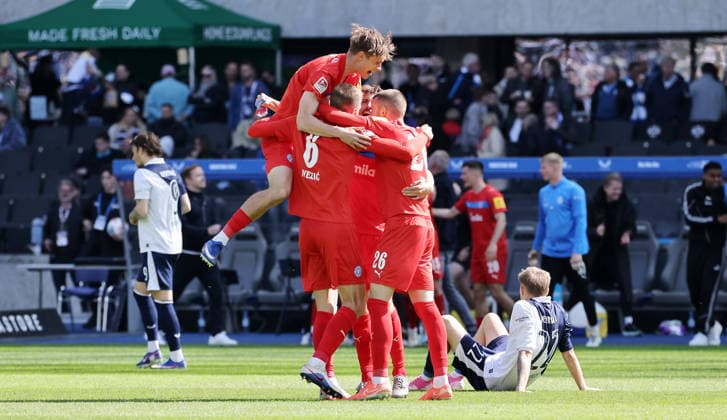 Holstein Kiel team cheers after the end of the match Joy Emotion Sport Soccer Football DFL 2 Bundesliga Men 31 Matchday Season 2025 2026 25 04 2026 Hertha BSC Berlin vs Holstein Kiel KSV DFL regulations prohibit any use of photographs as image sequences and or quasi video