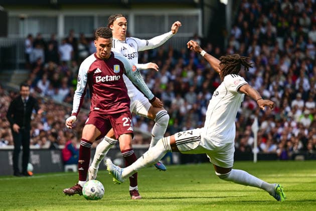 Fulham v Aston Villa, Premier League Fulham defender Calvin Bassey (3) tackles Aston Villa midfielder Morgan Rogers (27) during the Premier League match between Fulham and Aston Villa at Craven Cottage, London, UK on 25 April 2026. London Craven Cottage Greater London UK Editorial use only DataCo restrictions apply See www.football-dataco.com , Copyright: xDennisxGoodwinx PSI-24149-0060