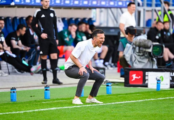 Coach Christian Eichner Karlsruher SC shouts during the 2 Bundesliga match between Karlsruher SC and Hannover 96 at BBBank Wildpark on April 25, 2026 in Karlsruhe, Germany Photo by Silas Schüller DeFodi Images Coach Christian Eichner Karlsruher SC shouts during the 2 Bundesliga match between Karlsruher SC and Hannover 96 at BBBank Wildpark on April 25, 2026 in Karlsruhe, Germany Photo by Silas Schüller DeFodi Images DFB DFL REGULATIONS PROHIBIT ANY USE OF PHOTOGRAPHS AS IMAGE SEQUENCES AND OR QUASI VIDEO Photo by Silas Schueller DeFodi Images