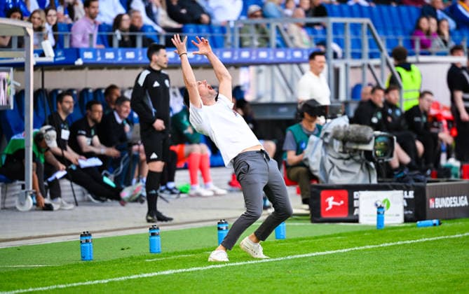 Coach Christian Eichner Karlsruher SC gestures and looks frustrated during the 2 Bundesliga match between Karlsruher SC and Hannover 96 at BBBank Wildpark on April 25, 2026 in Karlsruhe, Germany Germany Photo by Silas Schüller DeFodi Images Coach Christian Eichner Karlsruher SC gestures and looks frustrated during the 2 Bundesliga match between Karlsruher SC and Hannover 96 at BBBank Wildpark on April 25, 2026 in Karlsruhe, Germany Photo by Silas Schüller DeFodi Images DFB DFL REGULATIONS PROHIBIT ANY USE OF PHOTOGRAPHS AS IMAGE SEQUENCES AND OR QUASI VIDEO Photo by Silas Schueller DeFodi Images