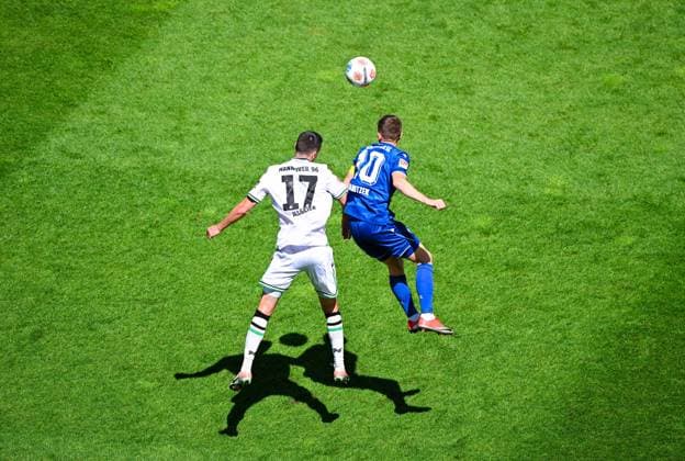 Bastian Allgeier Hannover 96 and Marvin Wanitzek Karlsruher SC battle for the ball during the 2 Bundesliga match between Karlsruher SC and Hannover 96 at BBBank Wildpark on April 25, 2026 in Karlsruhe, Germany Germany Photo by Silas Schüller DeFodi Images Bastian Allgeier Hannover 96 and Marvin Wanitzek Karlsruher SC battle for the ball during the 2 Bundesliga match between Karlsruher SC and Hannover 96 at BBBank Wildpark on April 25, 2026 in Karlsruhe, Germany Photo by Silas Schüller DeFodi Images DFB DFL REGULATIONS PROHIBIT ANY USE OF PHOTOGRAPHS AS IMAGE SEQUENCES AND OR QUASI VIDEO Photo by Silas Schueller DeFodi Images