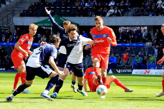 DEU, DFL, 2 FBL, Hertha BSC vs Holstein Kiel, 25 04 2026, Berliner Olympiastadion, Berlin, DEU, DFL, 2 FBL, Hertha BSC vs Holstein Kiel, in the picture Dawid Kownacki Hertha BSC Berlin 9 , Pascal Klemens Hertha BSC Berlin 41 , Marko Ivetic Holstein Kiel 6 , DFL regulations prohibit any use of Photographs as image sequences and or quasi video nordphotoxGmbHx xEngler nph00076