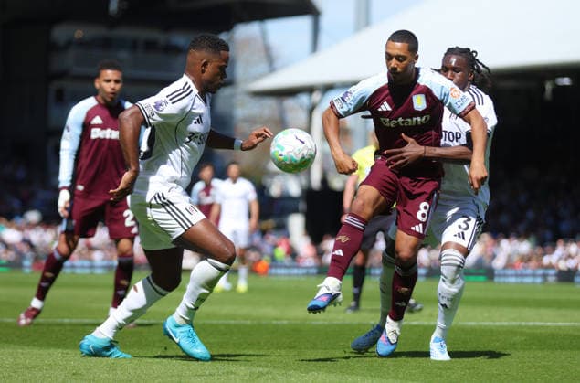 Fulham v Aston Villa, English Premier League, Gtech Community Stadium, Craven Cottage, London, UK - 25 04 2026 Youri Tielemans of Aston Villa is pressured by Calvin Bassey of Fulham during the Premier League game at Craven Cottage London Craven Cottage London GBR, UK NEWSPAPERS OUT Copyright: xMarkxGreenwoodx